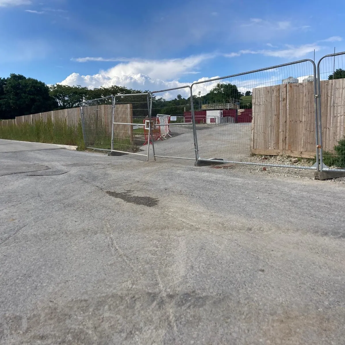 Construction site secured with temporary heras fencing panels