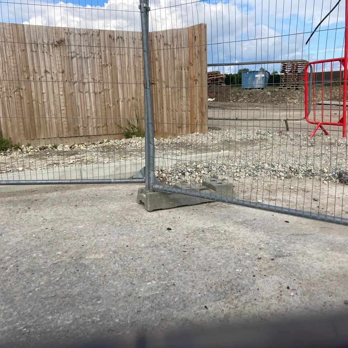 Temporary security fencing on a construction site with ground level monitoring