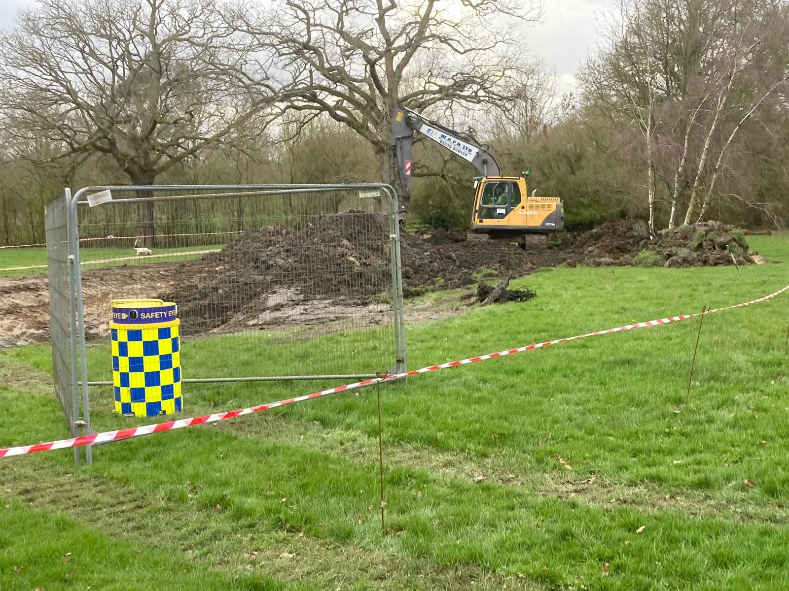 Safety Eye CCTV bollard on construction site with excavator working in background