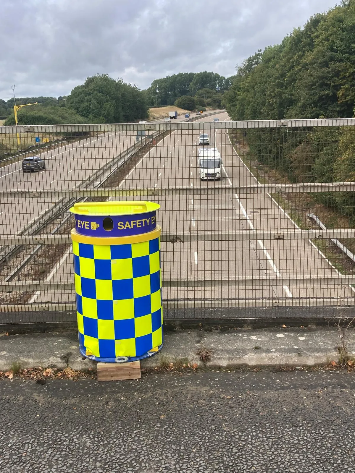 Safety Eye CCTV bollard on motorway bridge overpass for traffic and site security monitoring