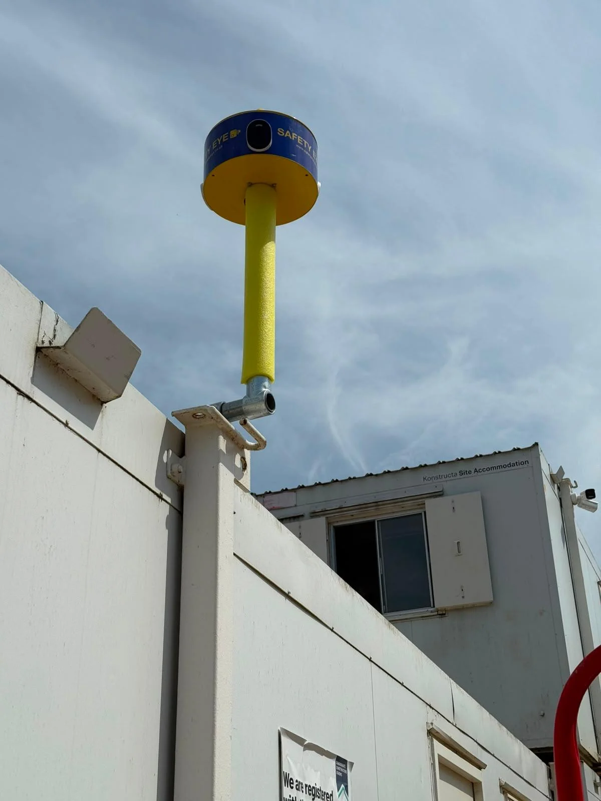 Safety Eye CCTV bollard wall mounted on a construction site accommodation cabin