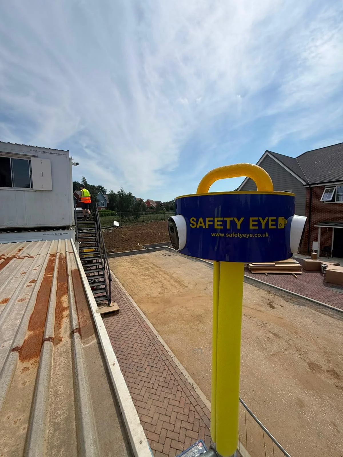 Ground level view of Safety Eye bollard with dual cameras at a new build housing development