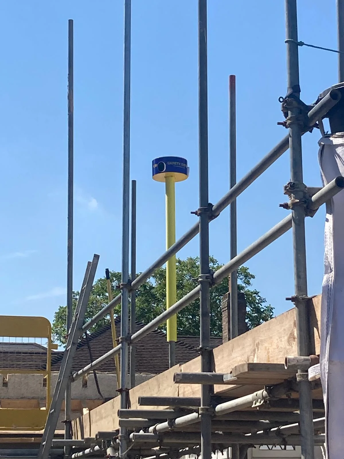 Safety Eye CCTV bollard installed on scaffolding at a residential construction site