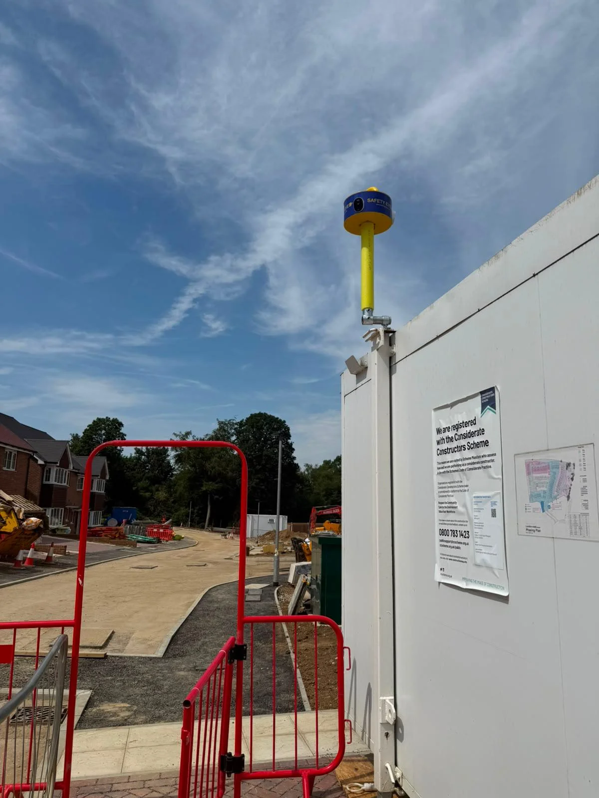 Safety Eye CCTV bollard monitoring the entrance gate of a housing development construction site
